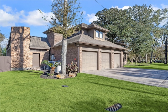 view of front facade featuring a front yard and a garage