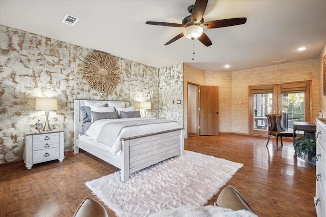 bedroom featuring hardwood / wood-style flooring and ceiling fan