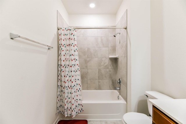 full bathroom with shower / tub combo, vanity, and toilet