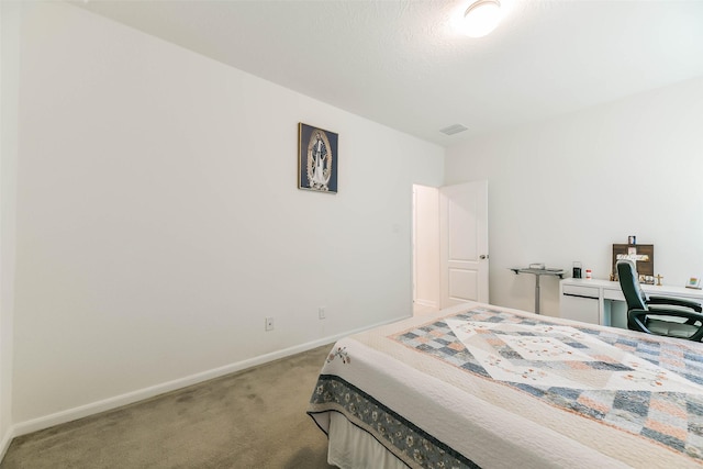 bedroom featuring carpet