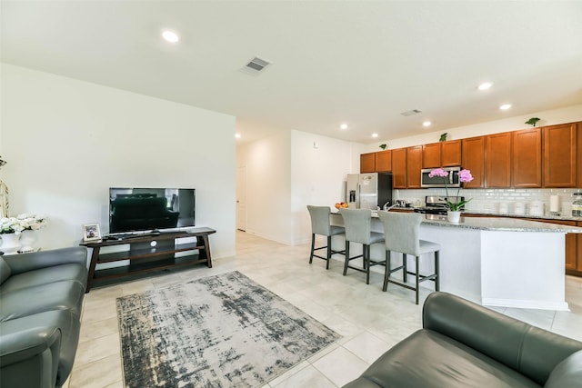 living room featuring light tile patterned floors