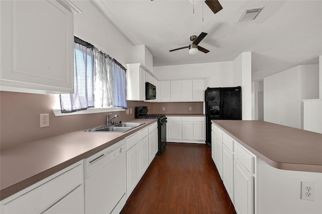 kitchen featuring white cabinetry, sink, ceiling fan, dark hardwood / wood-style floors, and black appliances