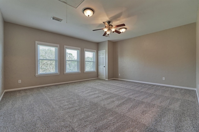 carpeted empty room with ceiling fan