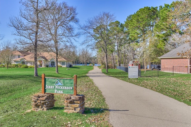 view of community with a lawn