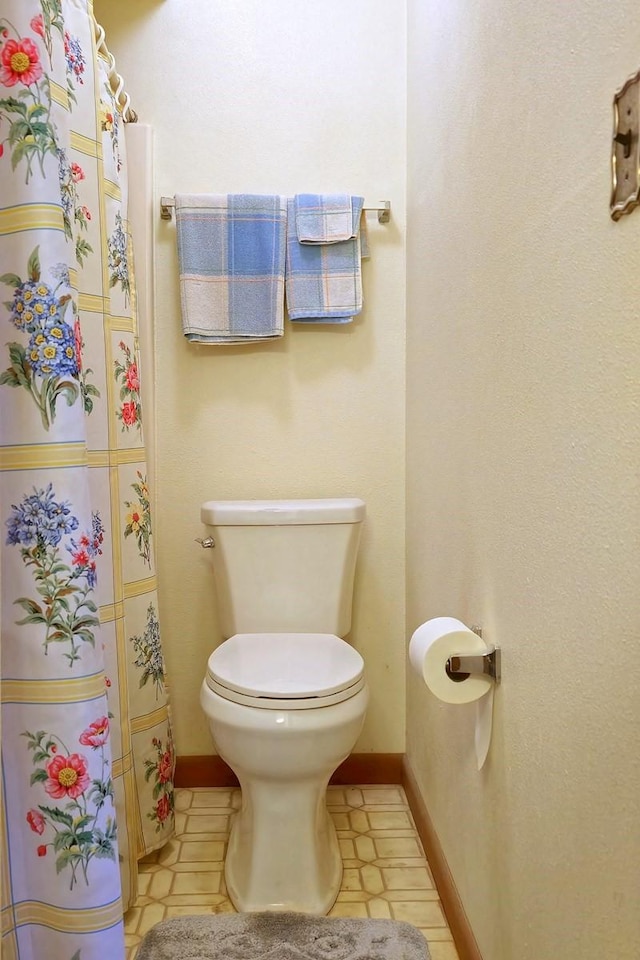 bathroom featuring toilet