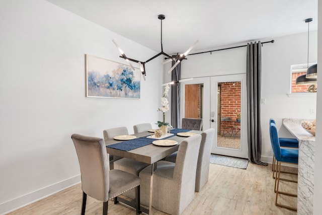 dining area with light hardwood / wood-style flooring