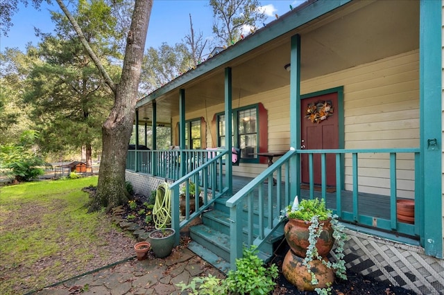 entrance to property with covered porch