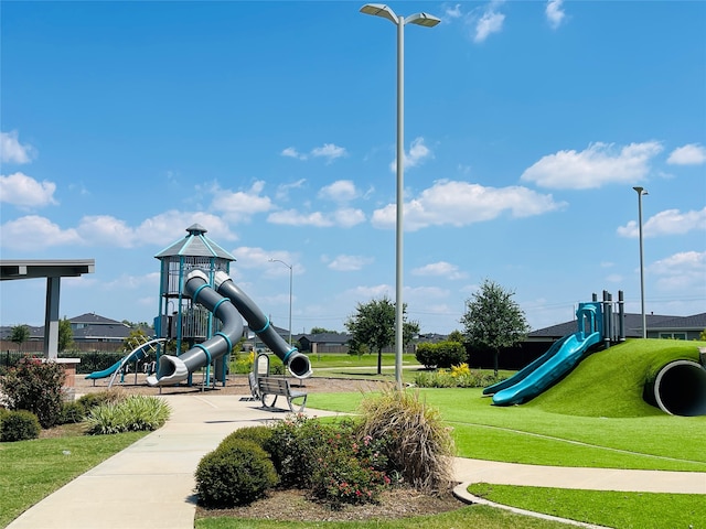 view of jungle gym with a yard