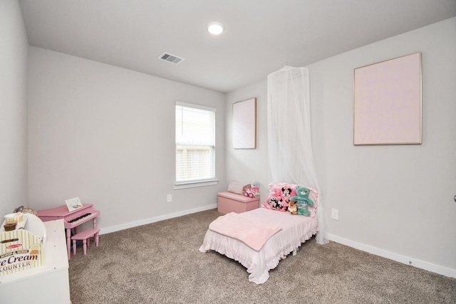 bedroom featuring carpet