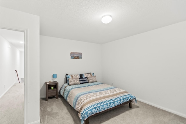 bedroom with light carpet