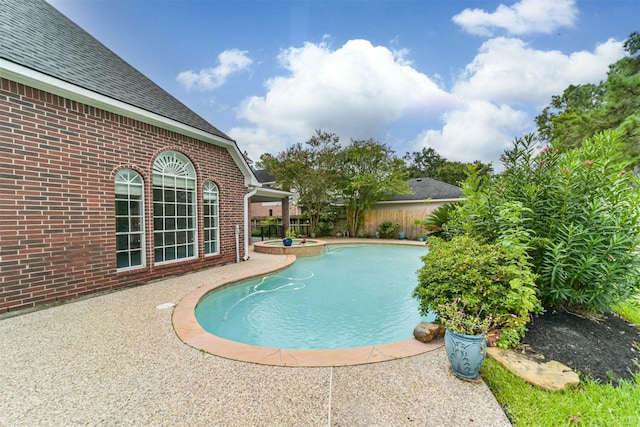 view of pool with a patio