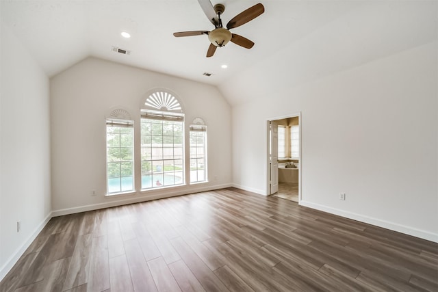 unfurnished room featuring ceiling fan, dark hardwood / wood-style floors, and lofted ceiling