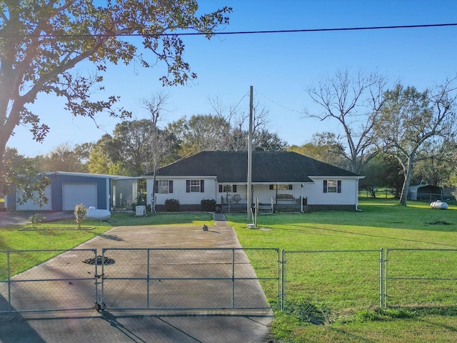 ranch-style home featuring a front yard and a garage