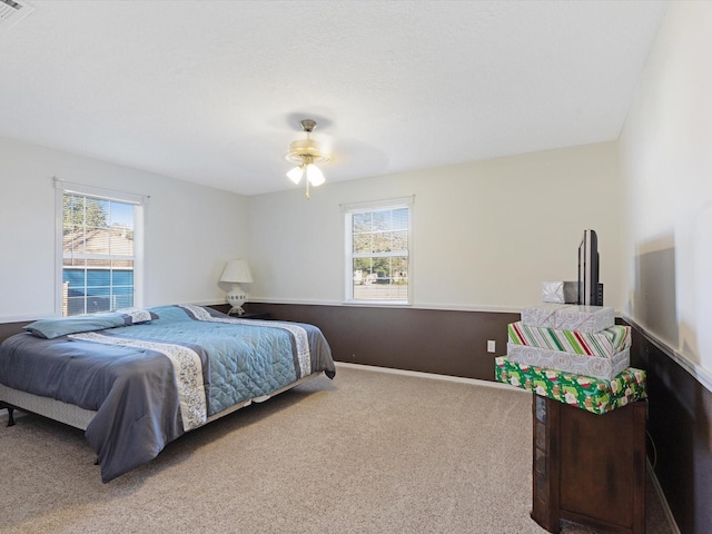 bedroom with carpet and ceiling fan