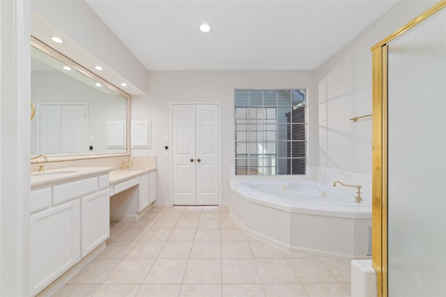 bathroom featuring tile patterned flooring, vanity, and plus walk in shower