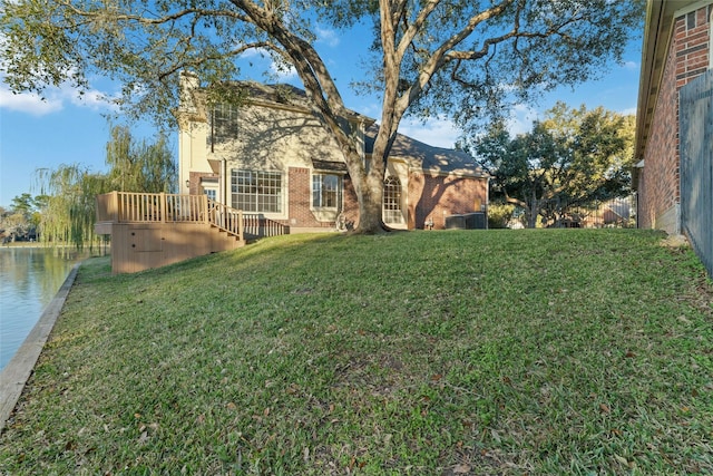 view of yard with a water view