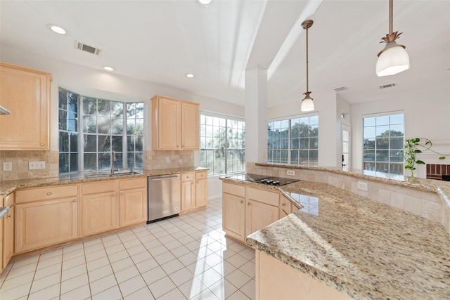 kitchen with decorative backsplash, hanging light fixtures, stainless steel dishwasher, and sink