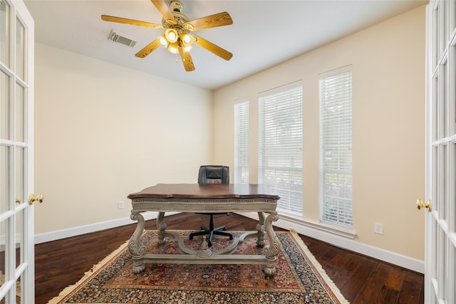 office space featuring french doors, ceiling fan, and dark wood-type flooring