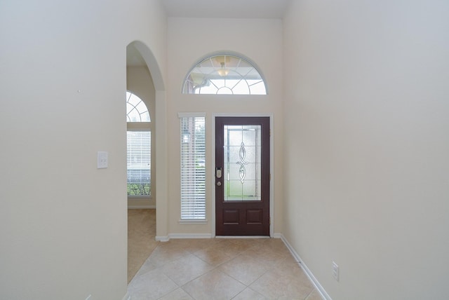 foyer with light tile patterned flooring