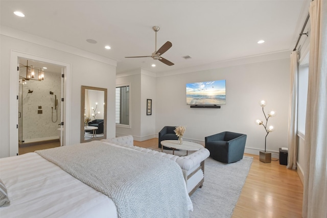 bedroom with ensuite bathroom, ceiling fan, crown molding, and light hardwood / wood-style flooring