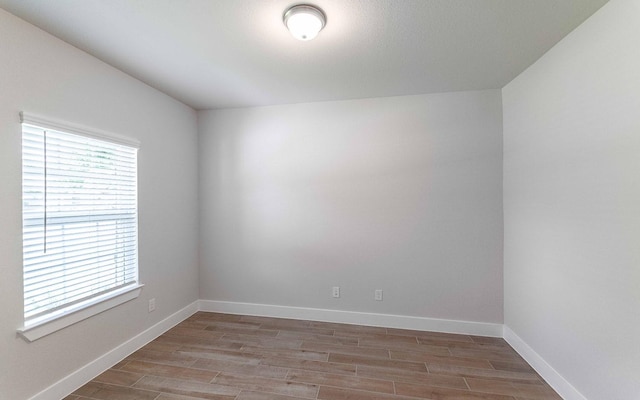 2319 Ridgewood Dr, West Columbia, TX 77486 - empty room featuring light wood-style floors and baseboards