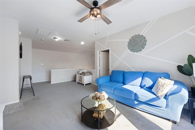 carpeted living room with lofted ceiling and ceiling fan