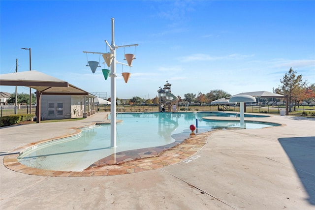 view of pool featuring a patio