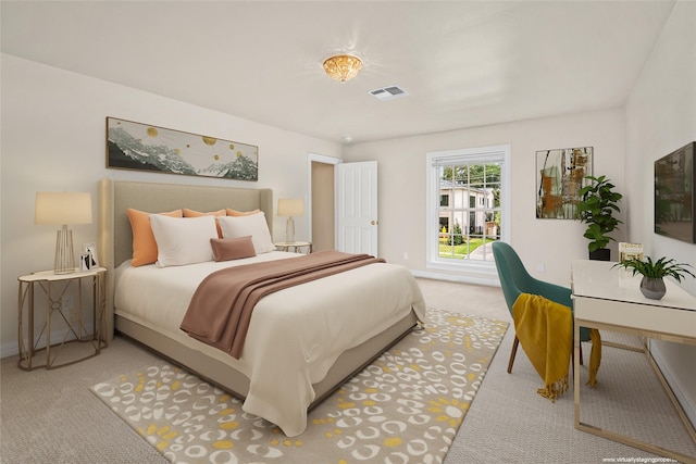 bedroom featuring light colored carpet