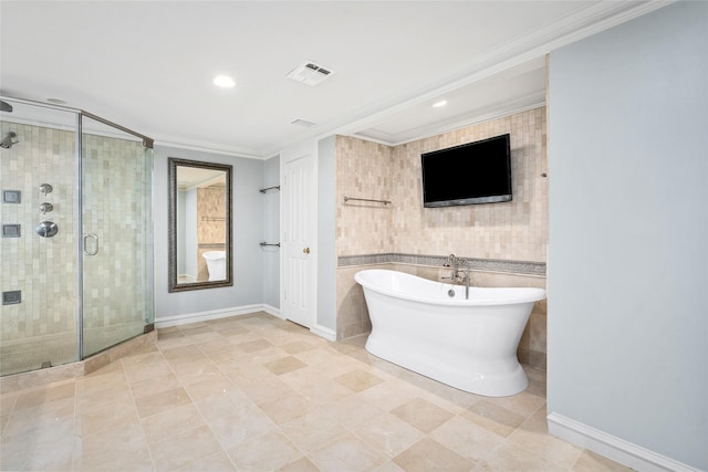 bathroom with tile patterned flooring, ornamental molding, and plus walk in shower