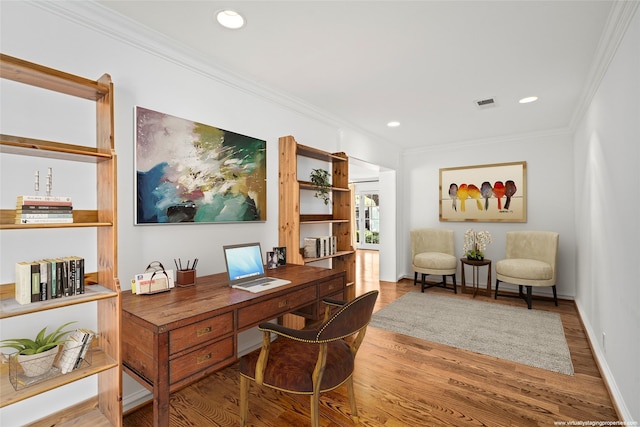 office space featuring wood-type flooring and ornamental molding