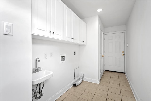 laundry room featuring hookup for an electric dryer, light tile patterned floors, cabinets, and washer hookup