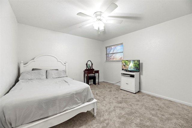 bedroom featuring ceiling fan and light colored carpet