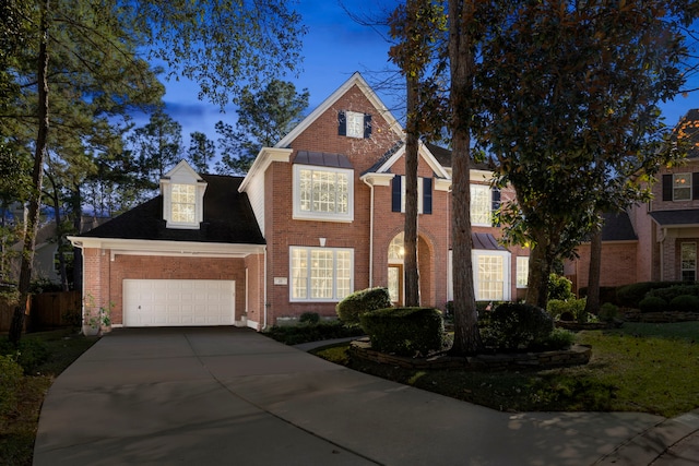 front of property featuring a garage