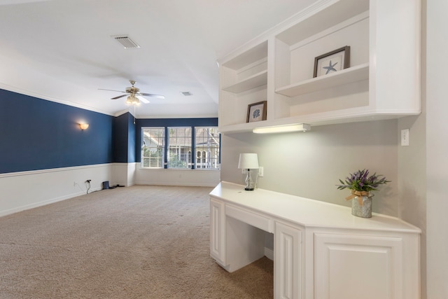 office area with light colored carpet, ceiling fan, and ornamental molding