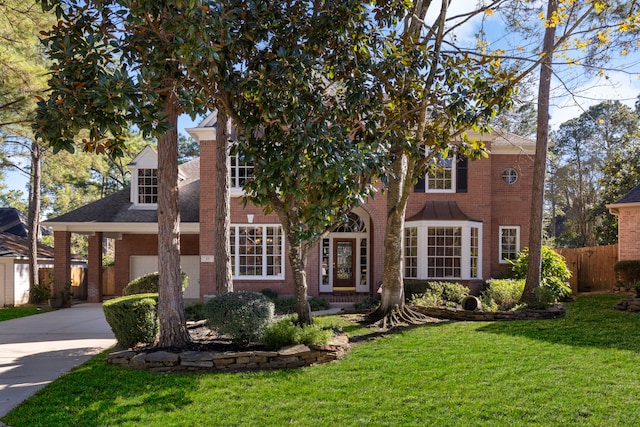 view of front facade with a front yard