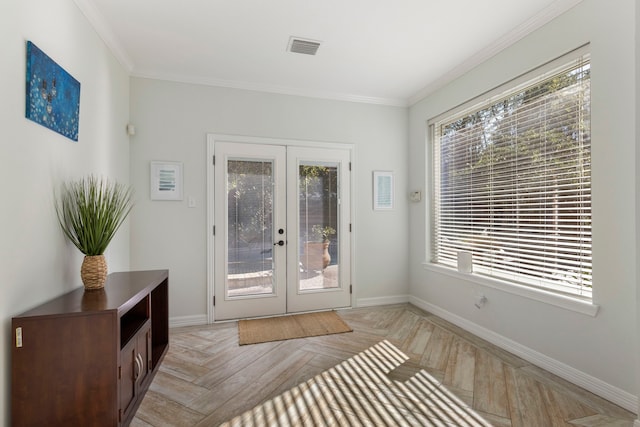 doorway featuring french doors, light parquet floors, and crown molding