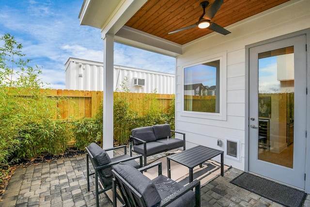 view of patio / terrace with ceiling fan and an outdoor hangout area