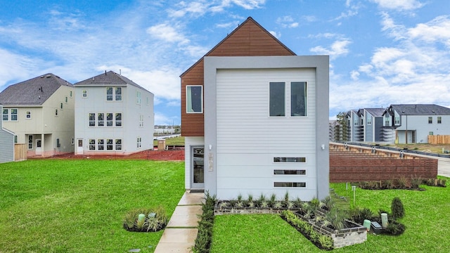 view of home's exterior featuring a lawn