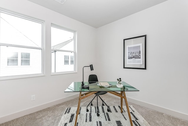 office area featuring carpet and a healthy amount of sunlight