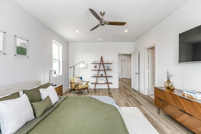 bedroom featuring ceiling fan and light wood-type flooring