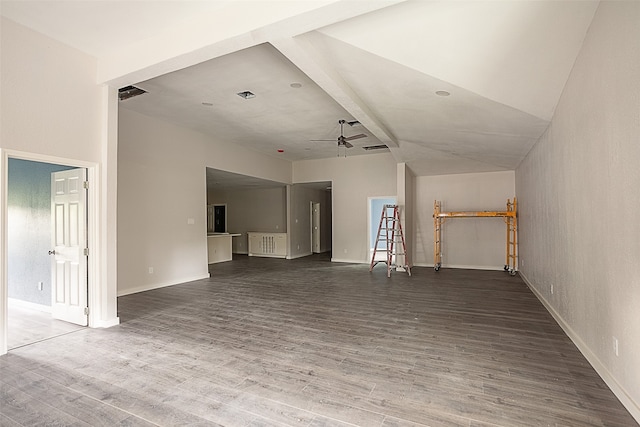 unfurnished living room featuring hardwood / wood-style floors, ceiling fan, and vaulted ceiling