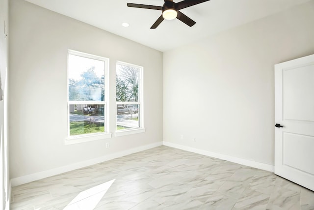 unfurnished room with ceiling fan