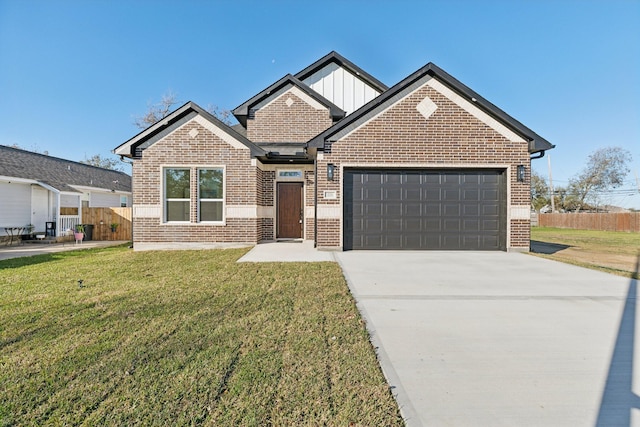 view of front of house with a garage and a front lawn