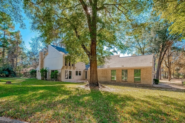 exterior space featuring a yard