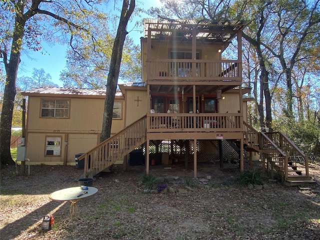 rear view of property with a deck