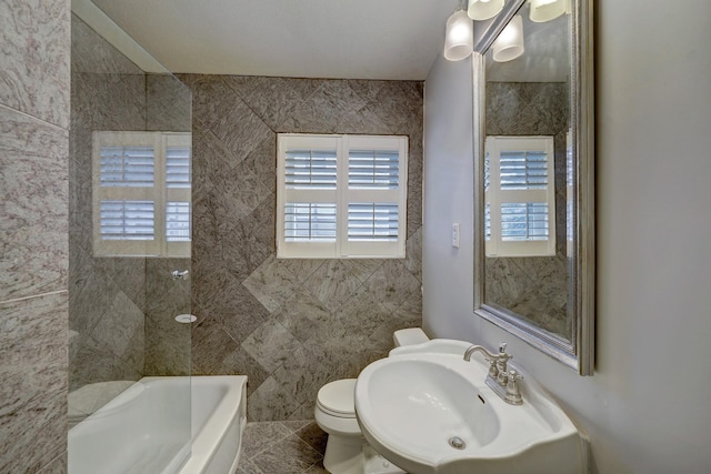 bathroom featuring toilet and sink