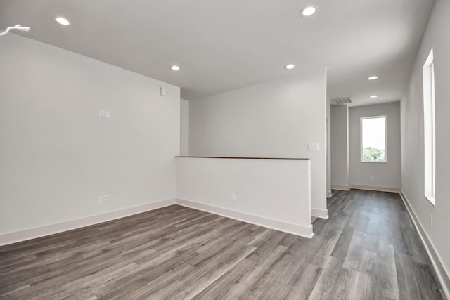 empty room featuring hardwood / wood-style floors