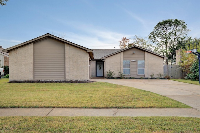 ranch-style house with a front yard