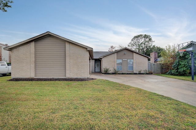 ranch-style home with a front yard