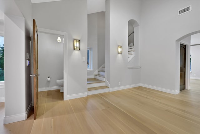 stairs featuring wood-type flooring